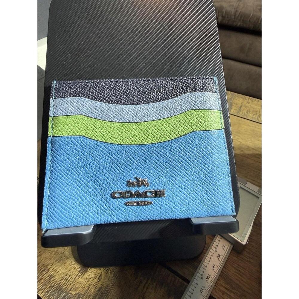 This vintage coach multicolor leather